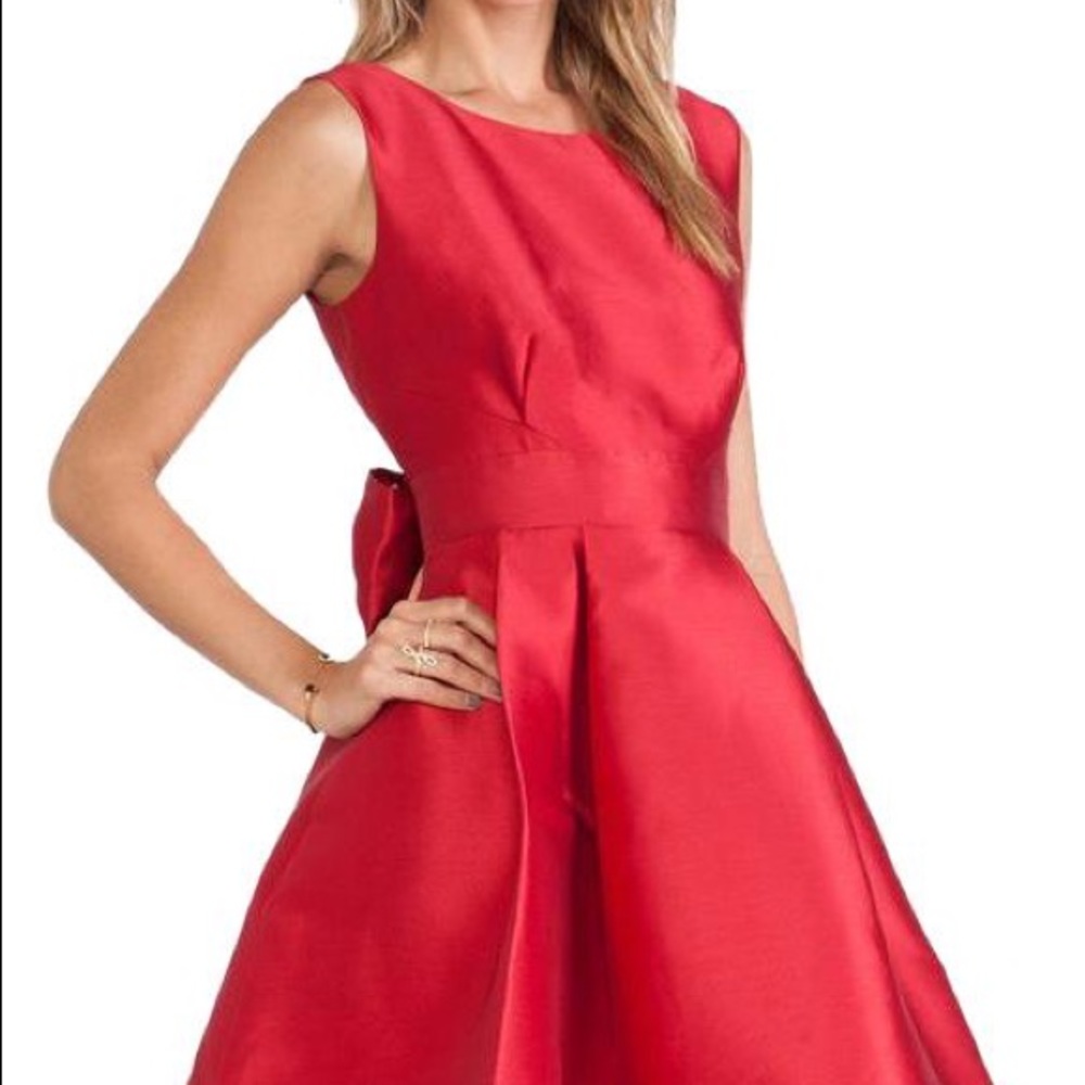 Red satin dress with open back and bow